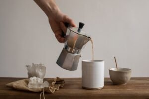 pouring coffee from mokapot